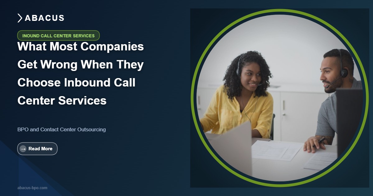 Inbound call center services agents at workstations with performance dashboards and real-time queue monitoring