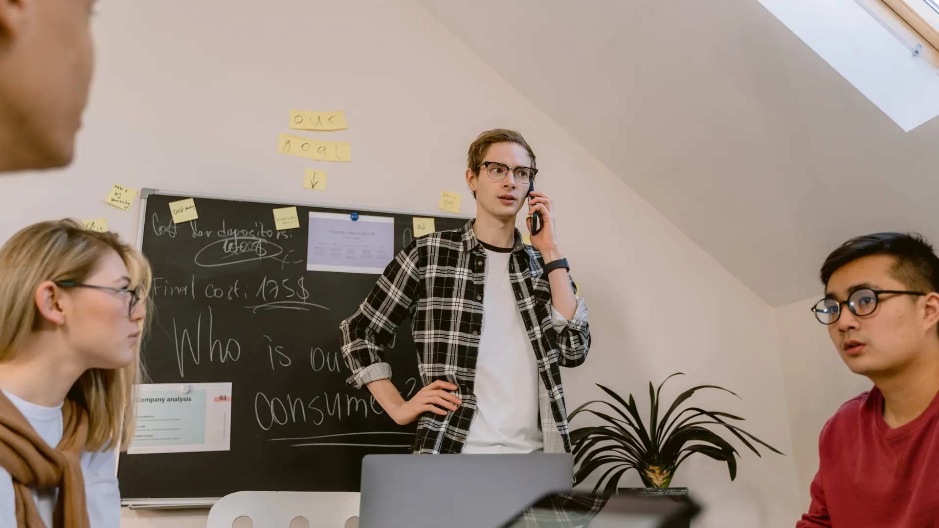 Diverse team discussing strategies in a modern startup office setting