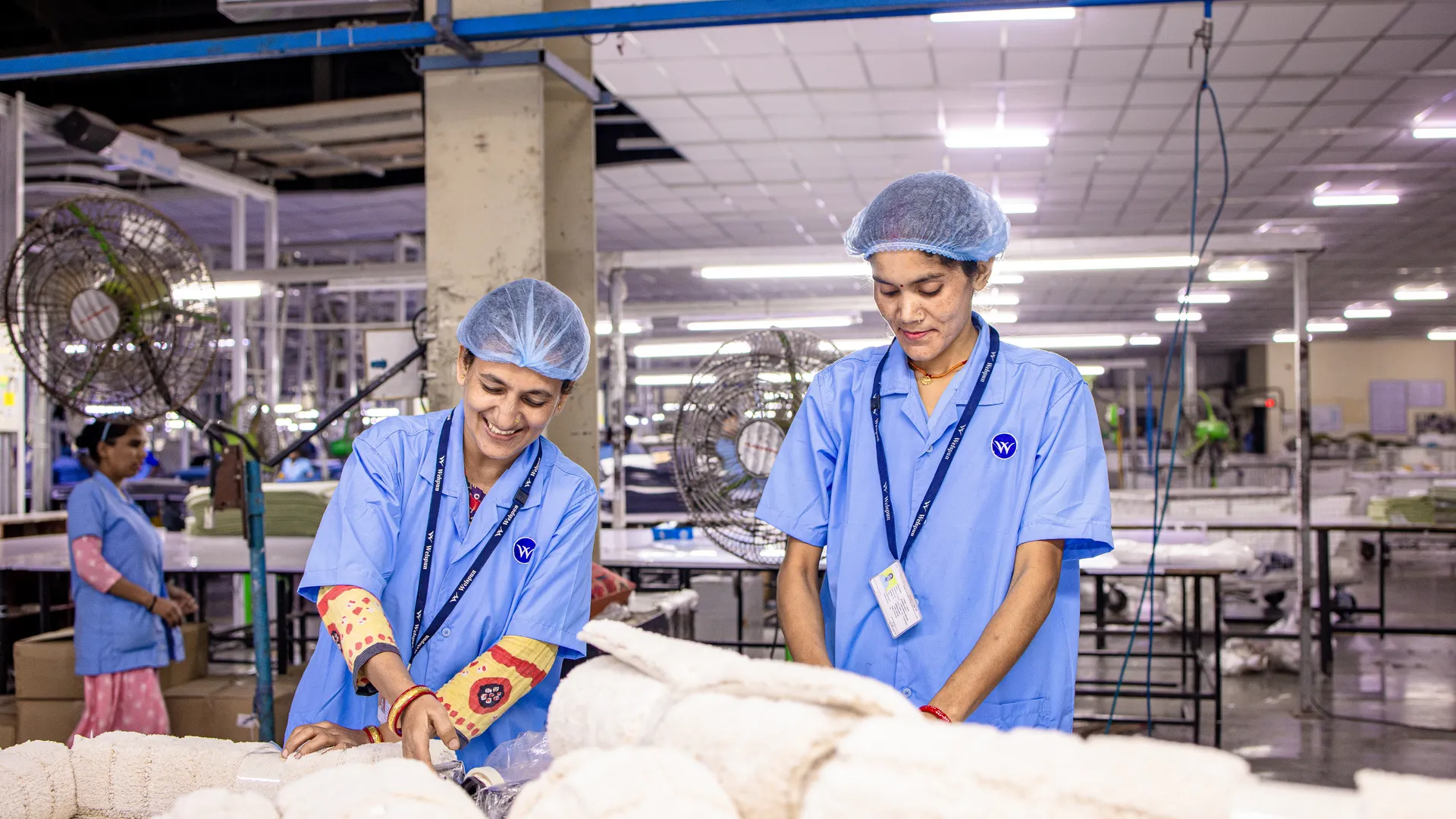 Smiling Indian factory workers