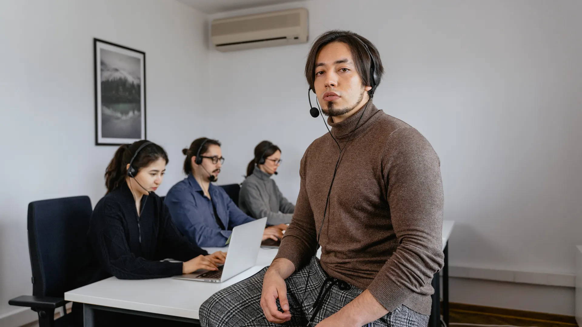 Focused call center team working together