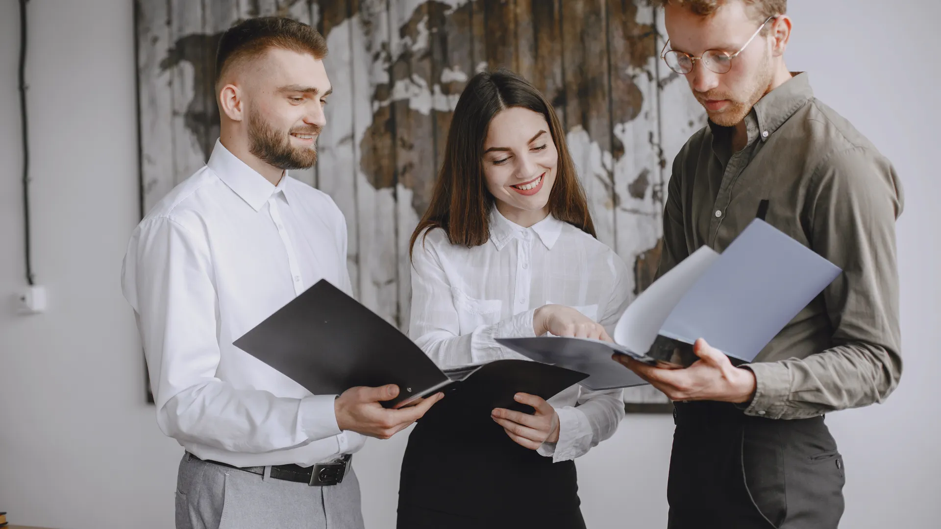 Three young professionals collaborating