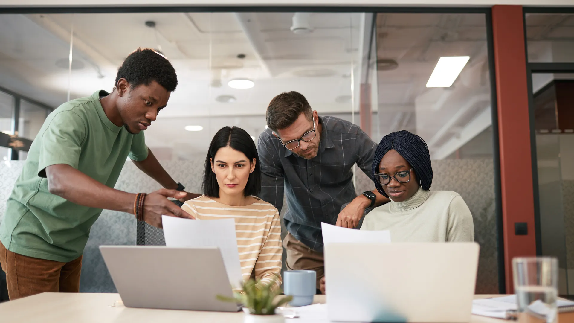A diverse team of colleagues collaborates