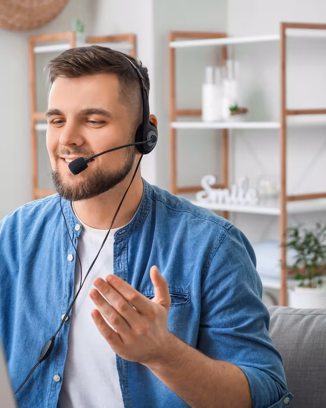 A telemarketing agent on a headset working through a call from a tested script